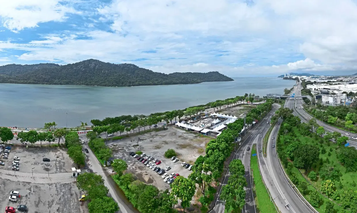 Looking out from near Queensbay Mall in Bayan Lepas, across the channel the new bridge will span, toward Pulau Jerejak. Photo: Chan Boon Kai/The Star